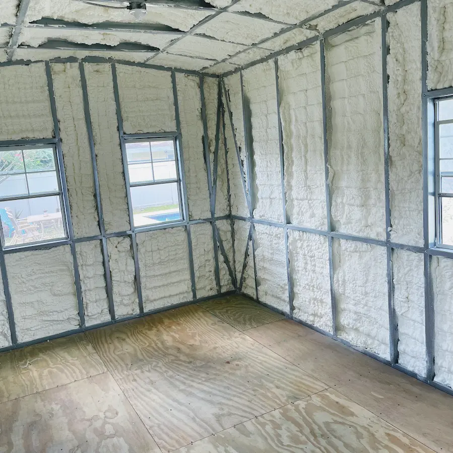 Closed-cell spray foam insulation applied to wall cavities in a residential project in Waveland
